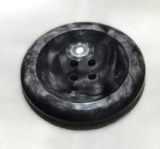 Stor melerad svart/vit knapp 4 hål 33 mm
